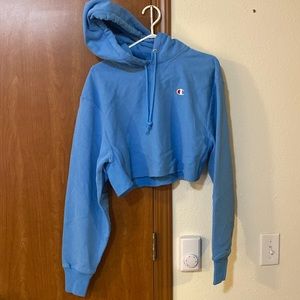 LIGHT BLUE CHAMPION SWEATSHIRT size: small, fits like a medium with the cropping